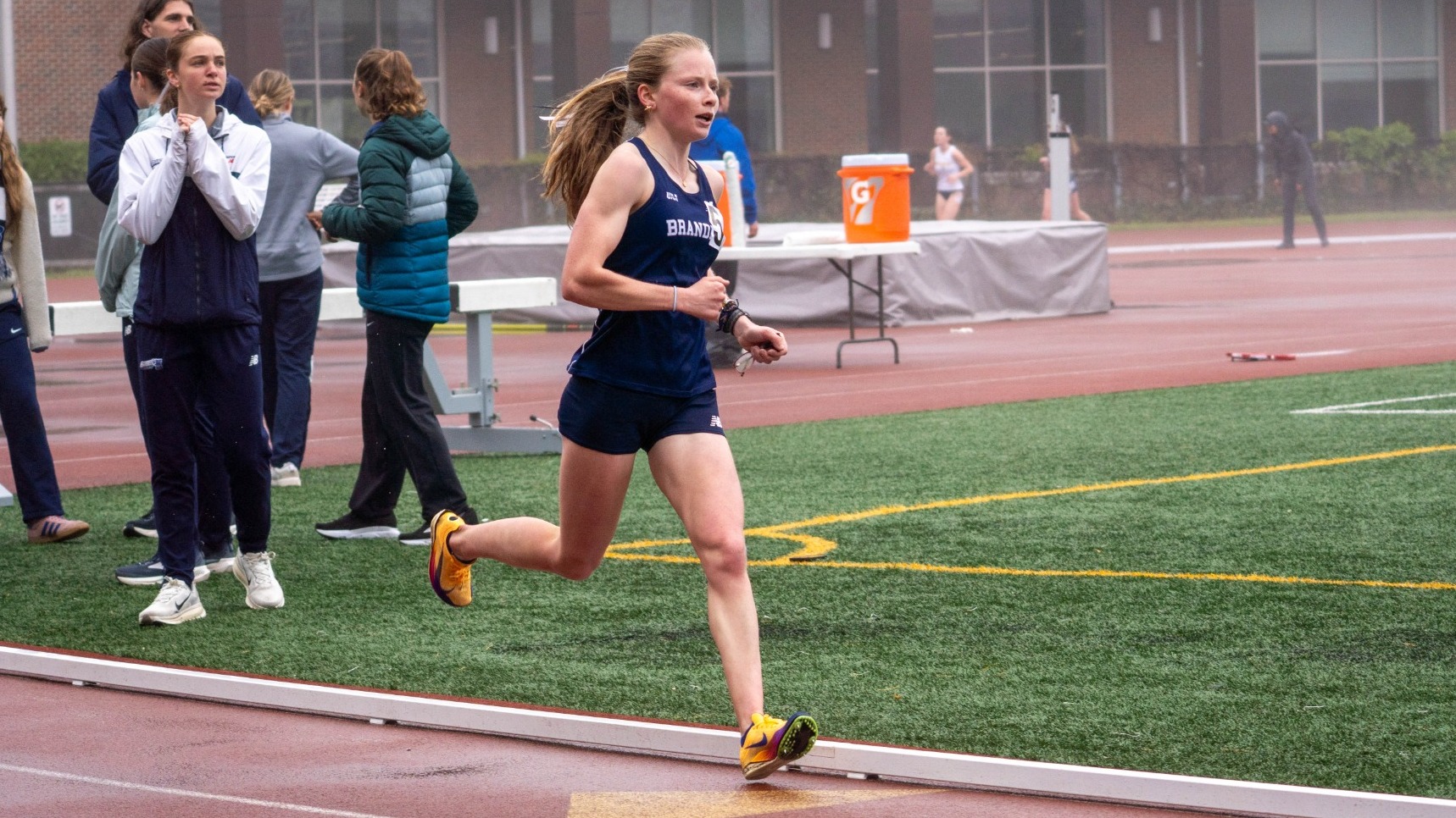 Shae Regan runs a race during the outdoor track season