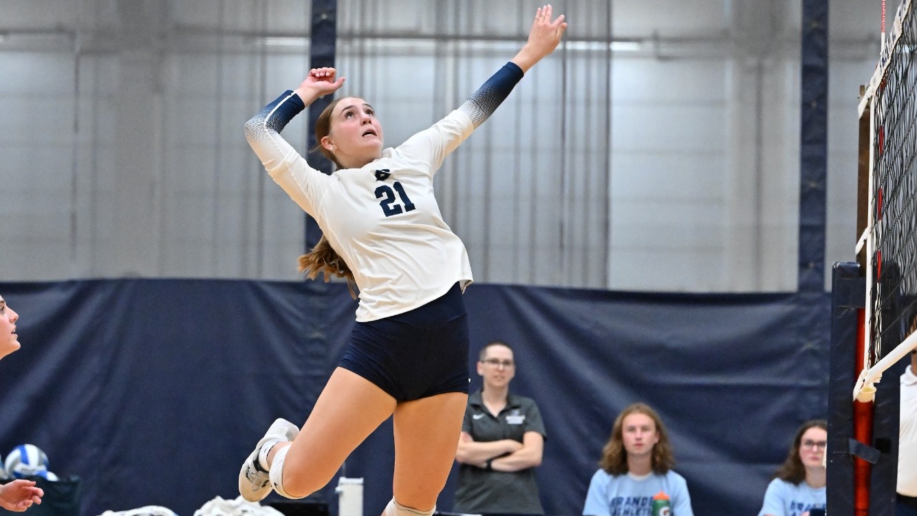 Emmory Casto goes on the attack during a volleyball match