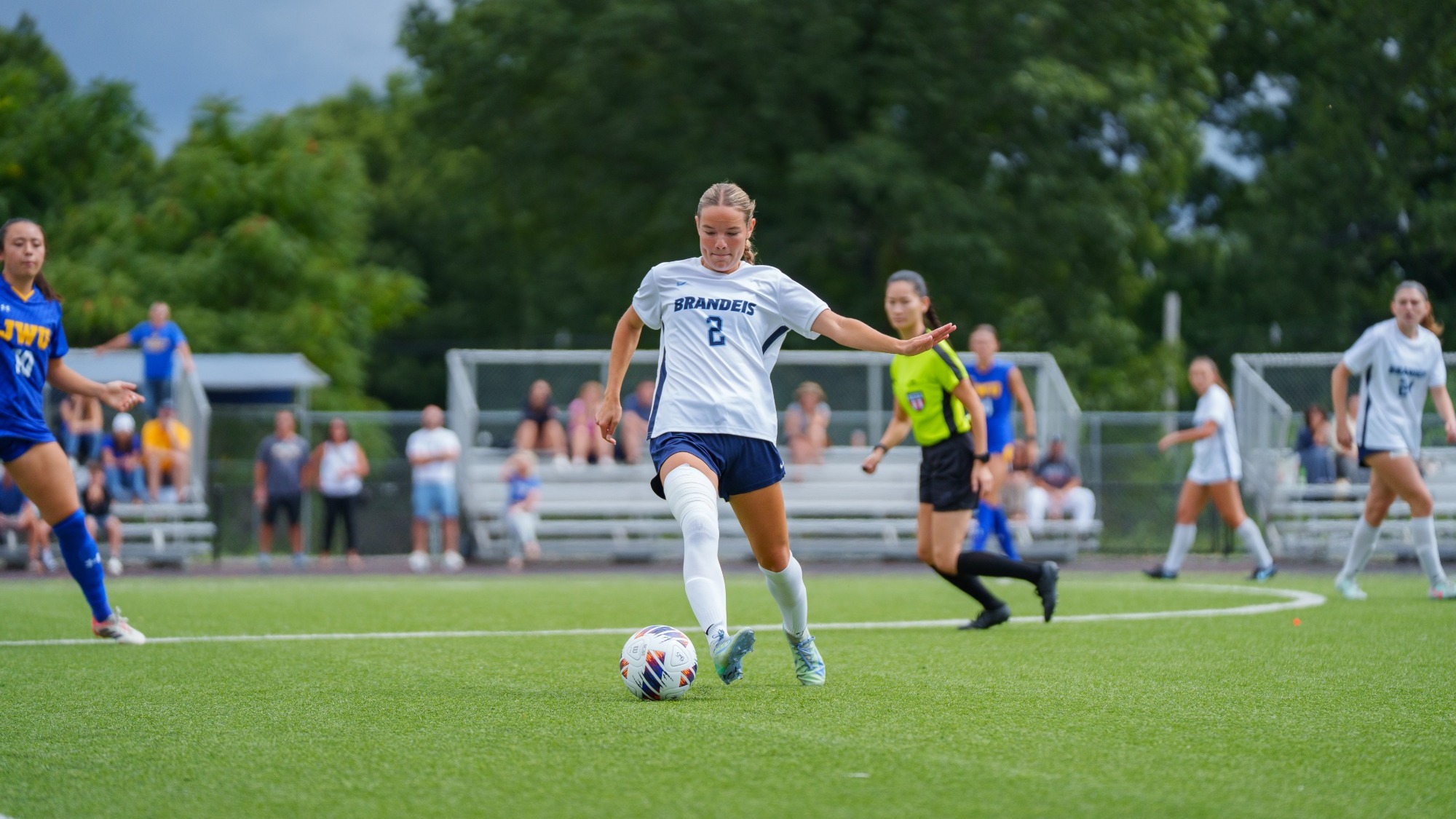 Moira Koleno plays a soccer ball during a match