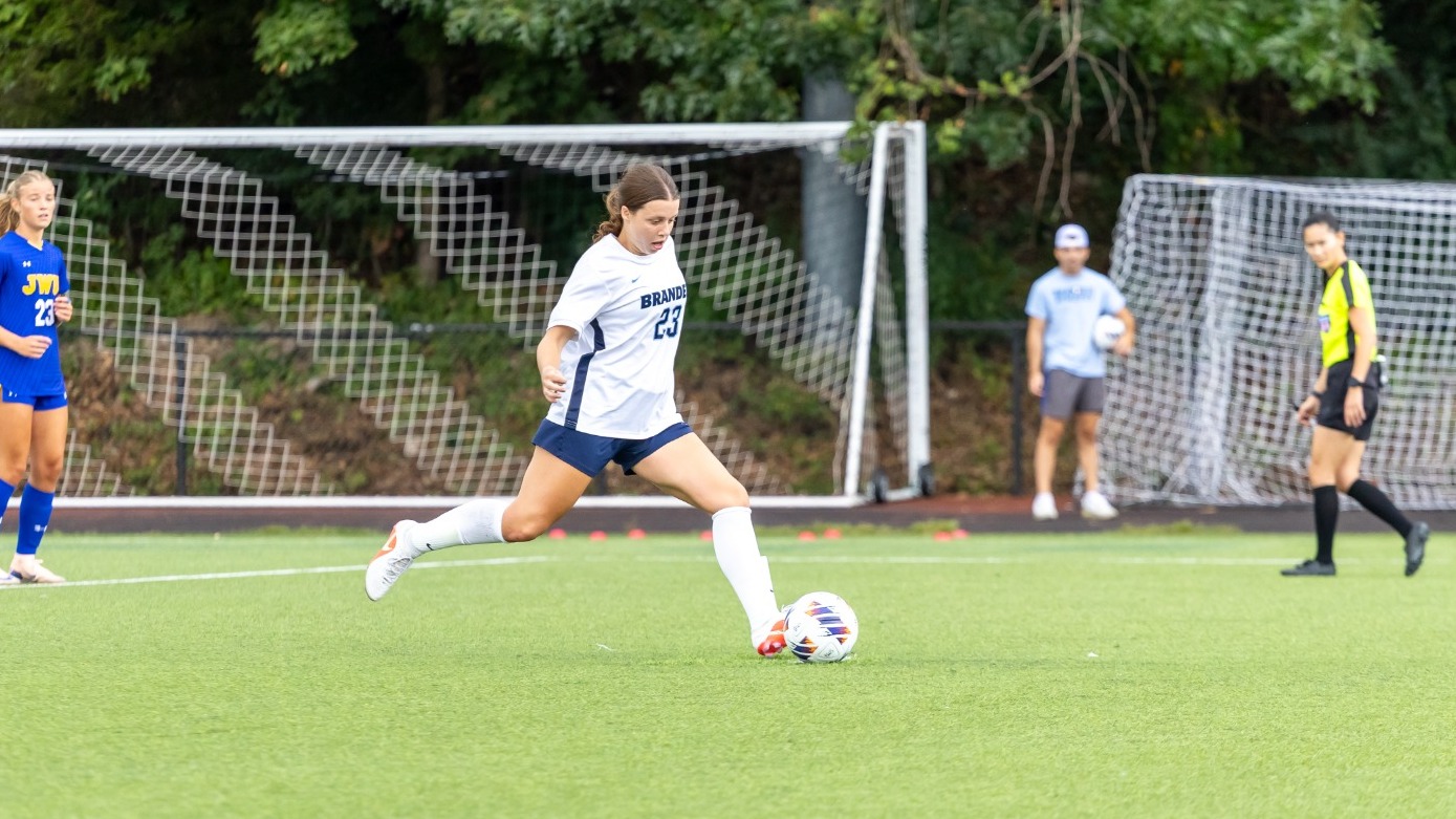 Grace Carman takes the game-winning penalty kick