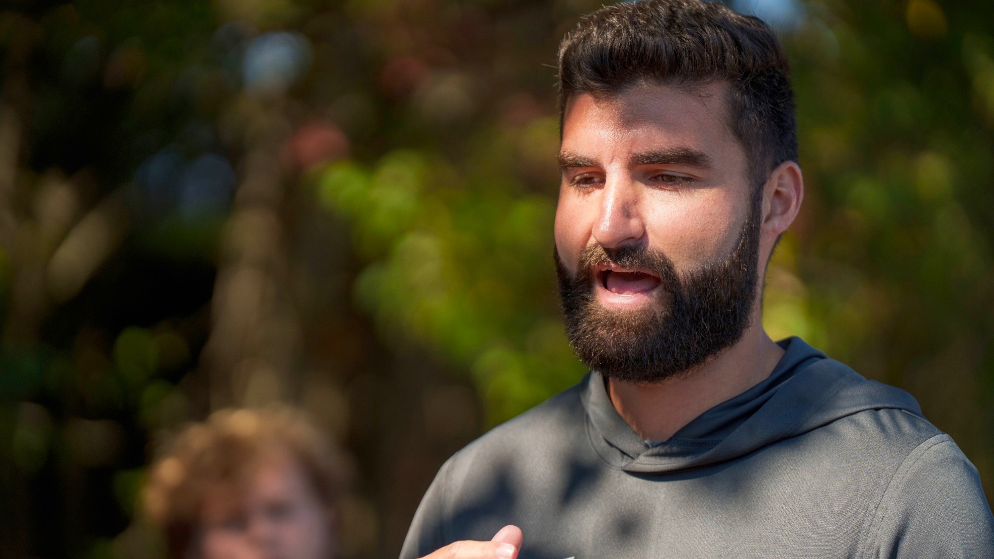 Blake Aronson speaks to the Brandeis soccer team