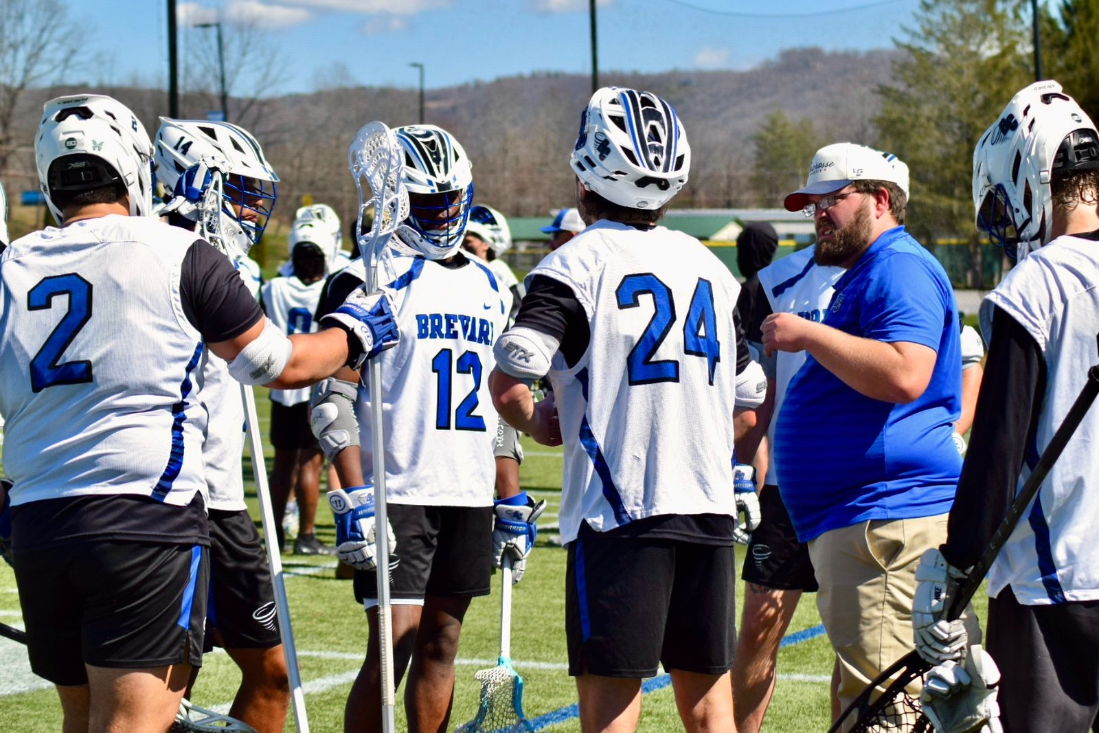 MLAX huddle 26