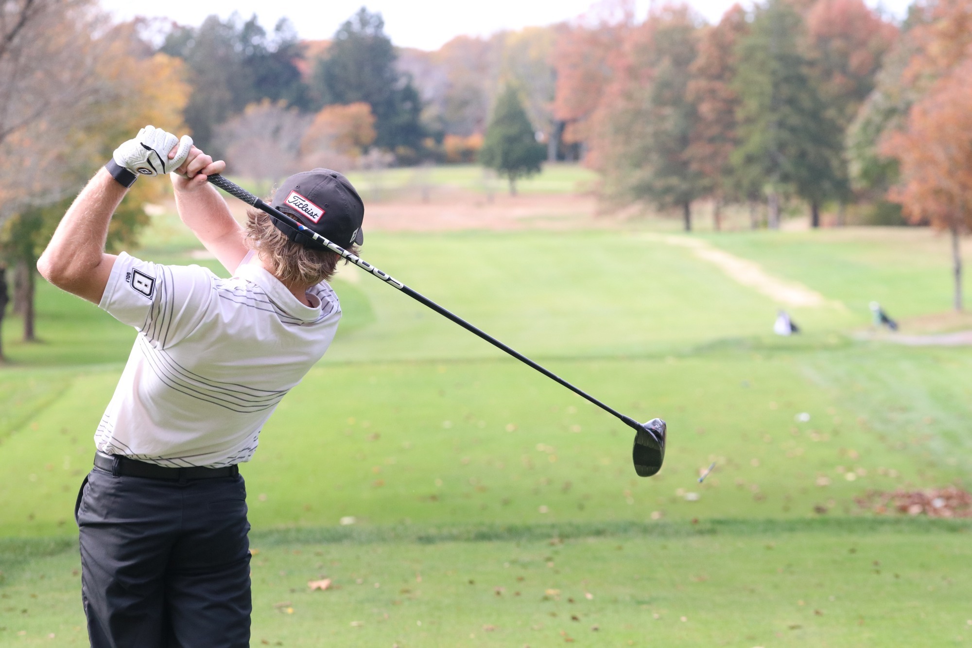 Correia swinging and admiring his drive