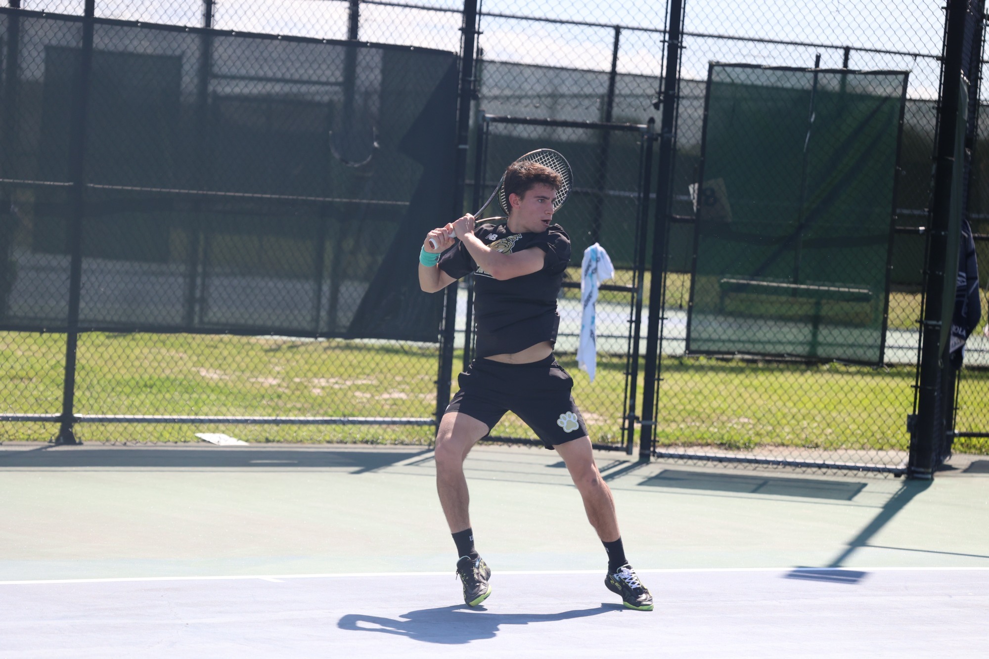 Machado preparing to hit a backhand