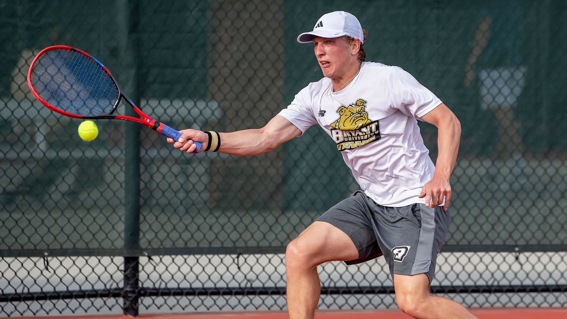 Myles Peterson preparing to hit a forehand shot