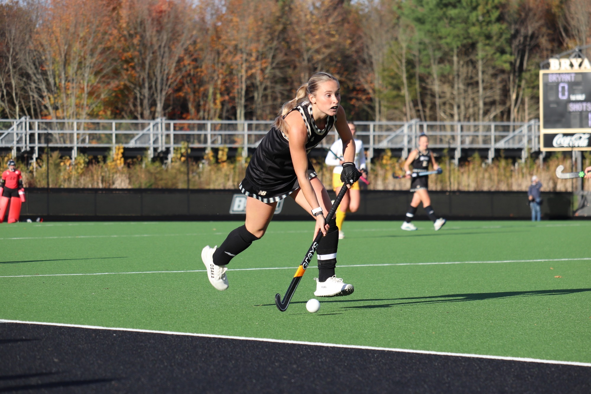 Zoe Bates Carries the Ball upfield vs Vermont