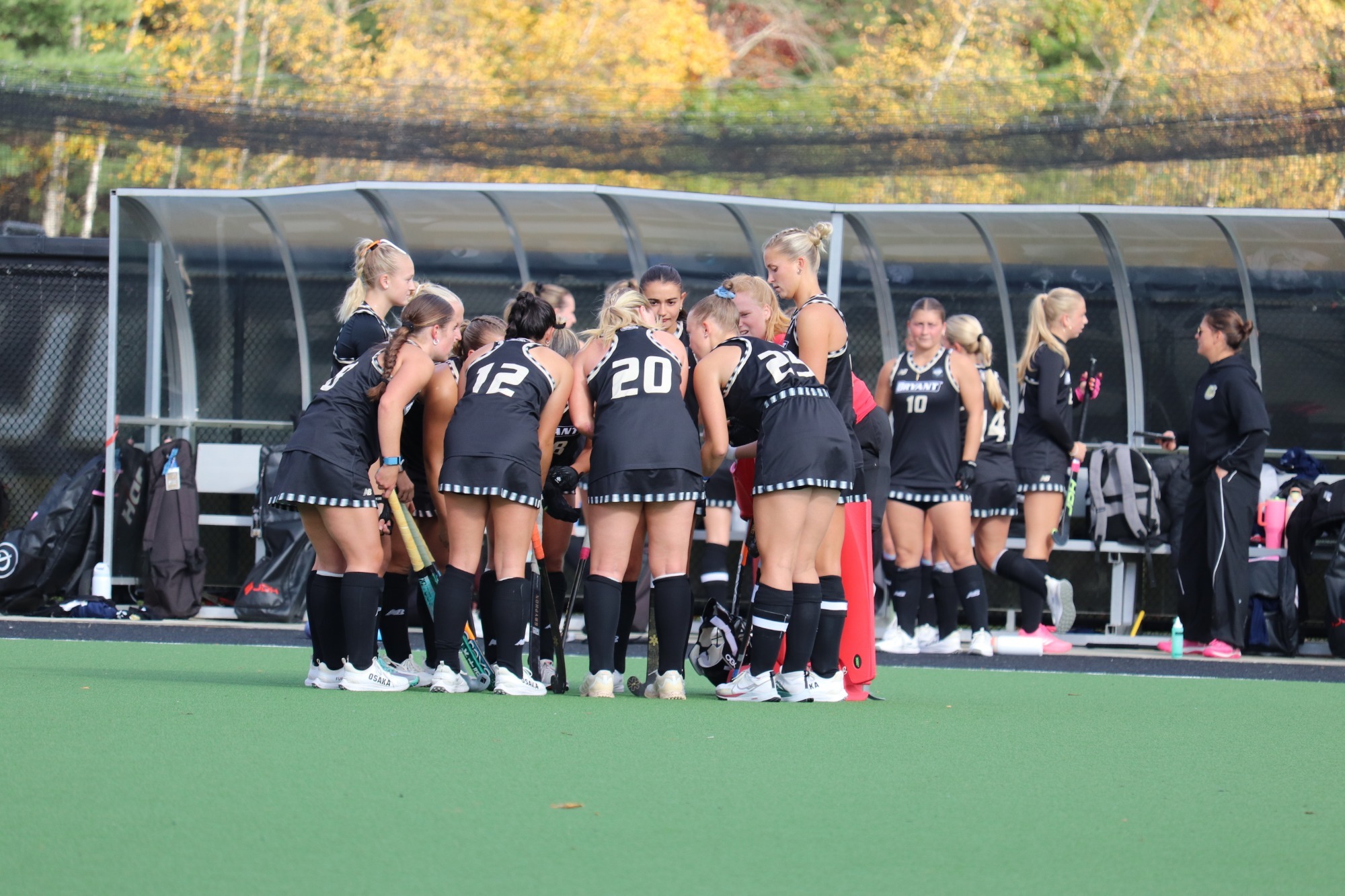 Field Hockey Team Huddles vs Vermont