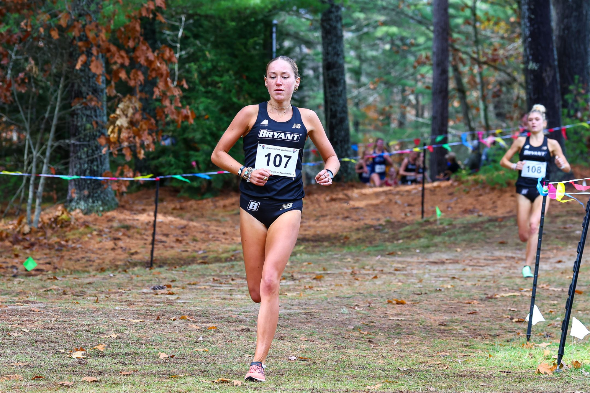 Jasmine Trott leads the pack, running behind everyone in sight