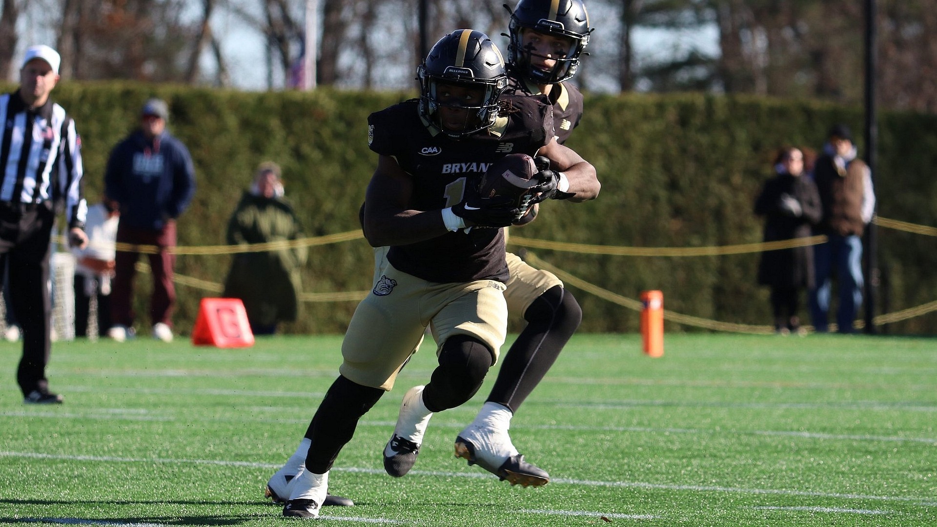 Elijah Elliott carries the ball vs UNH