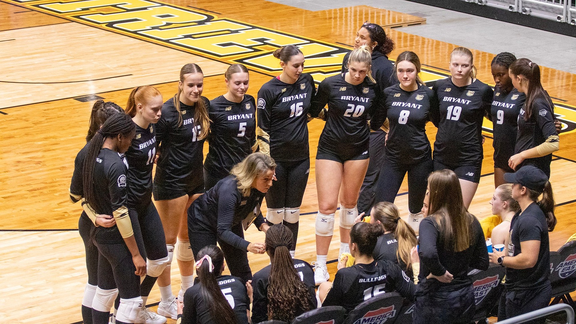 Coach Garlacy speaking to team during a timeout vs. UAlbany in AE Semis