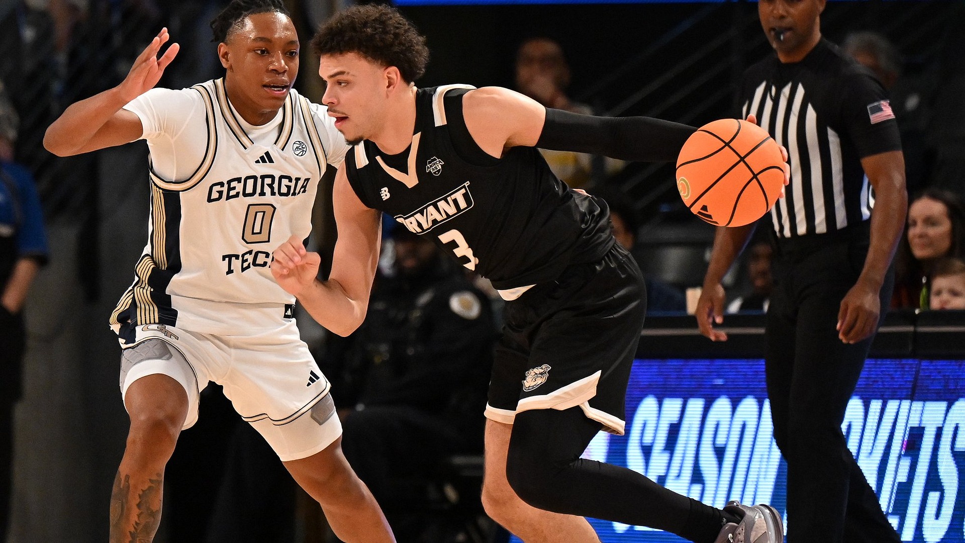 Aaron Davis Dribbles against a defender at Georgia Tech