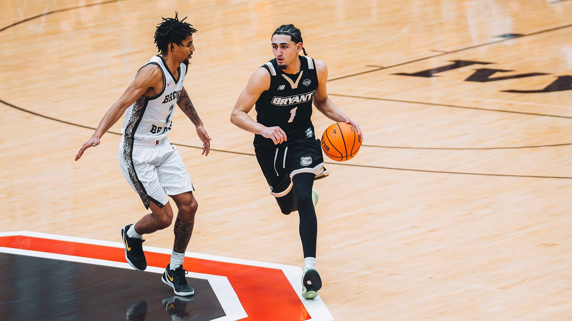Ty Tabales Dribbles by his defender at Brown