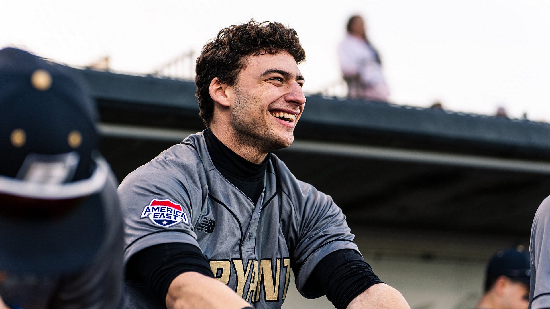 Justin Hackett Smiles on the Bench at UCF