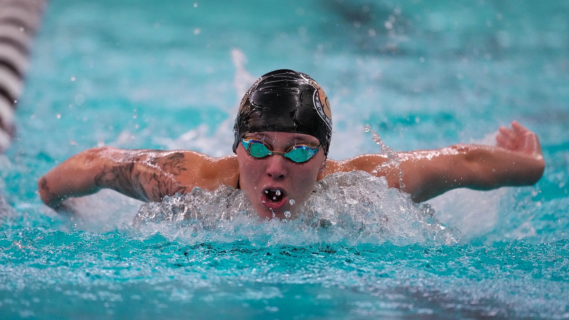 Bryant Swimmer against Umass