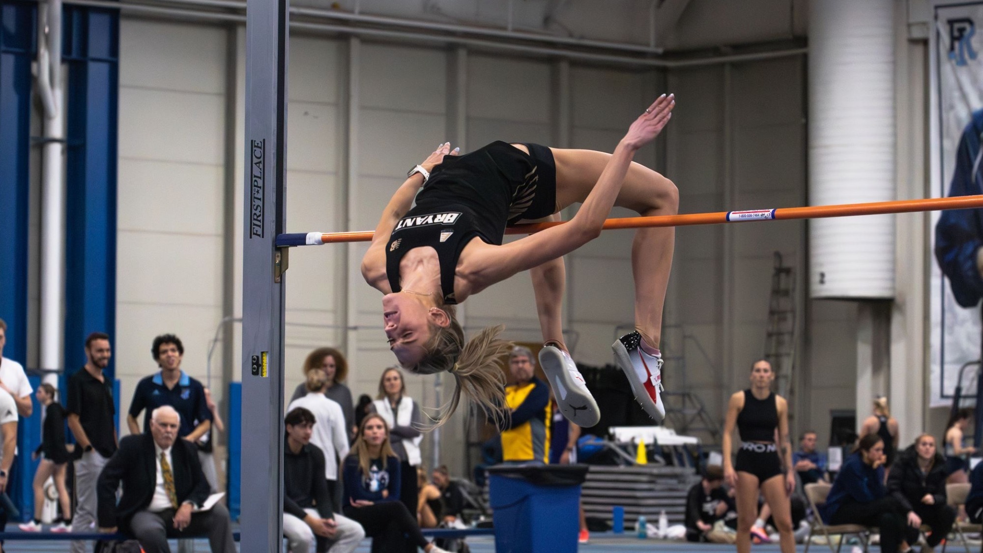bryant student-athlete pole vaulting successfully