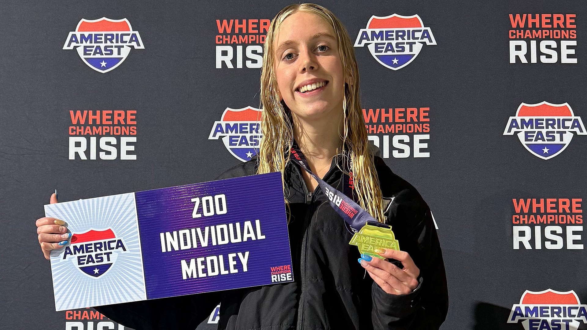 Ruby Tonelli-Smith poses with gold medal