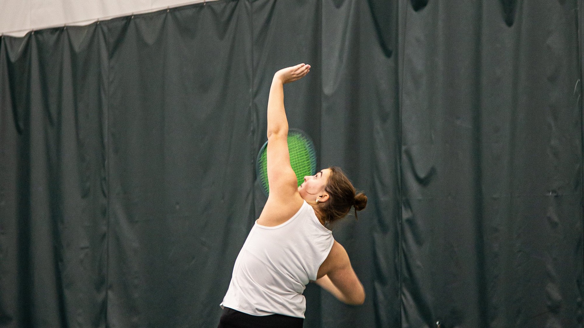 Lucia Pino ready to serve vs. Hofstra 