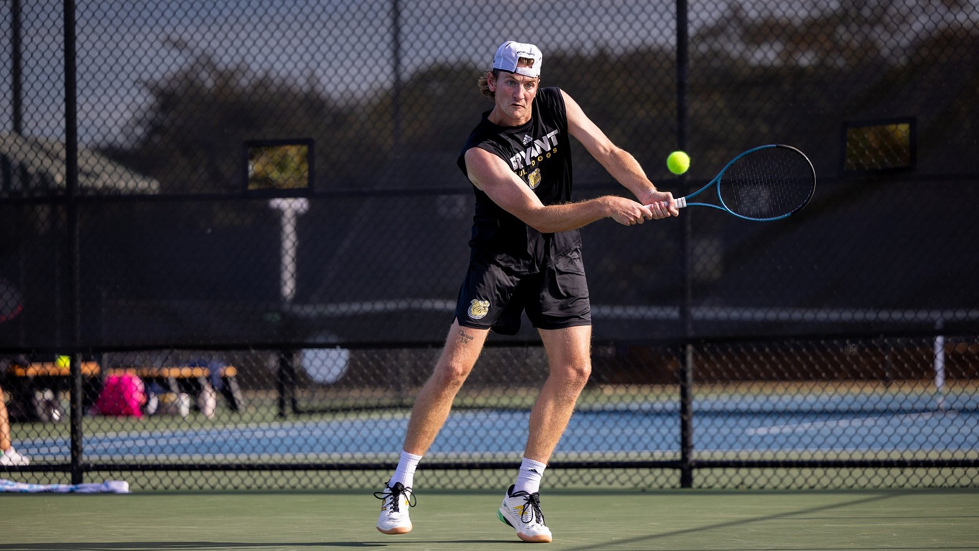 Will Pellegrini hitting a backhand shot 