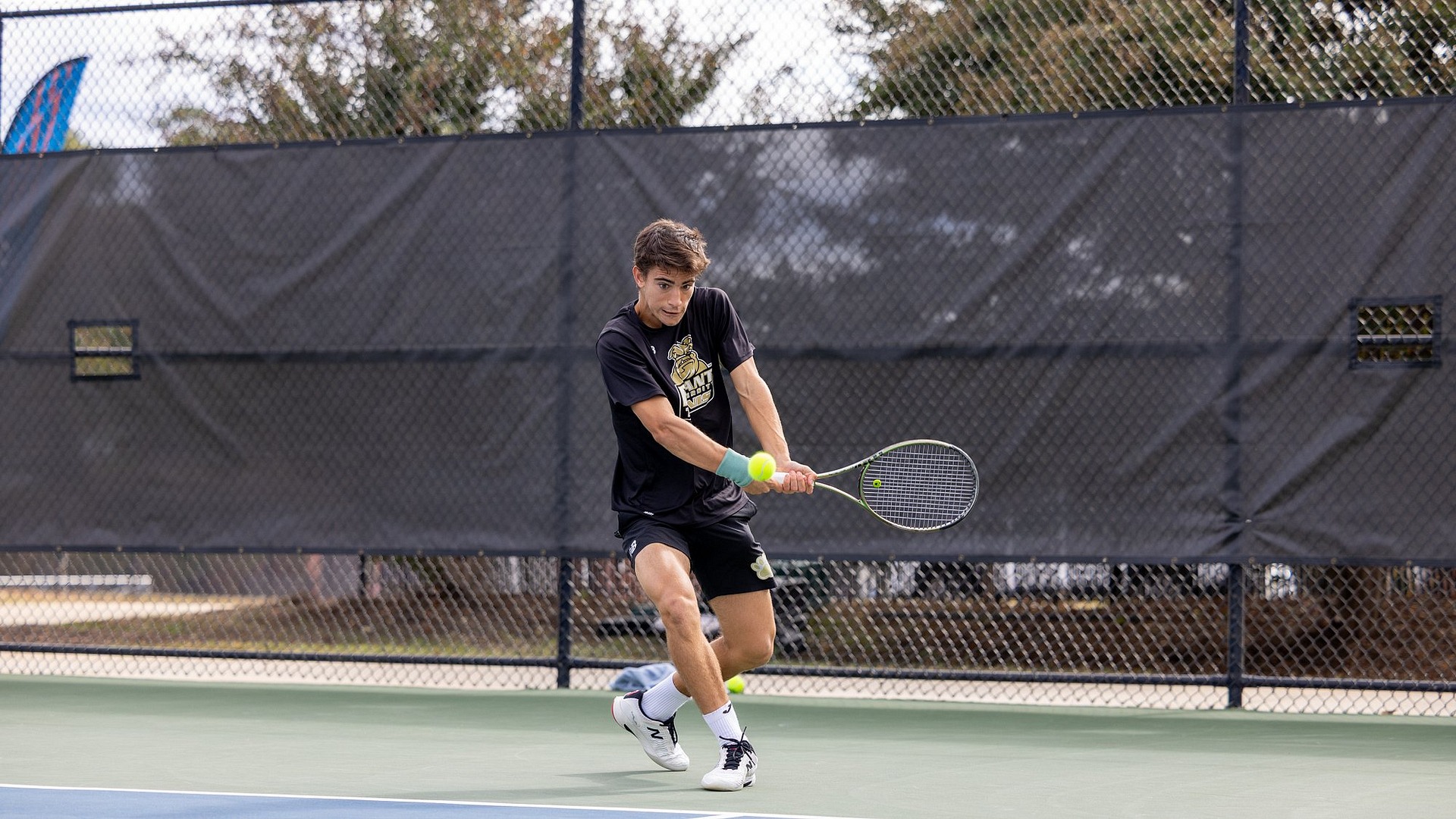 Miguel Machado striking a backhand shot