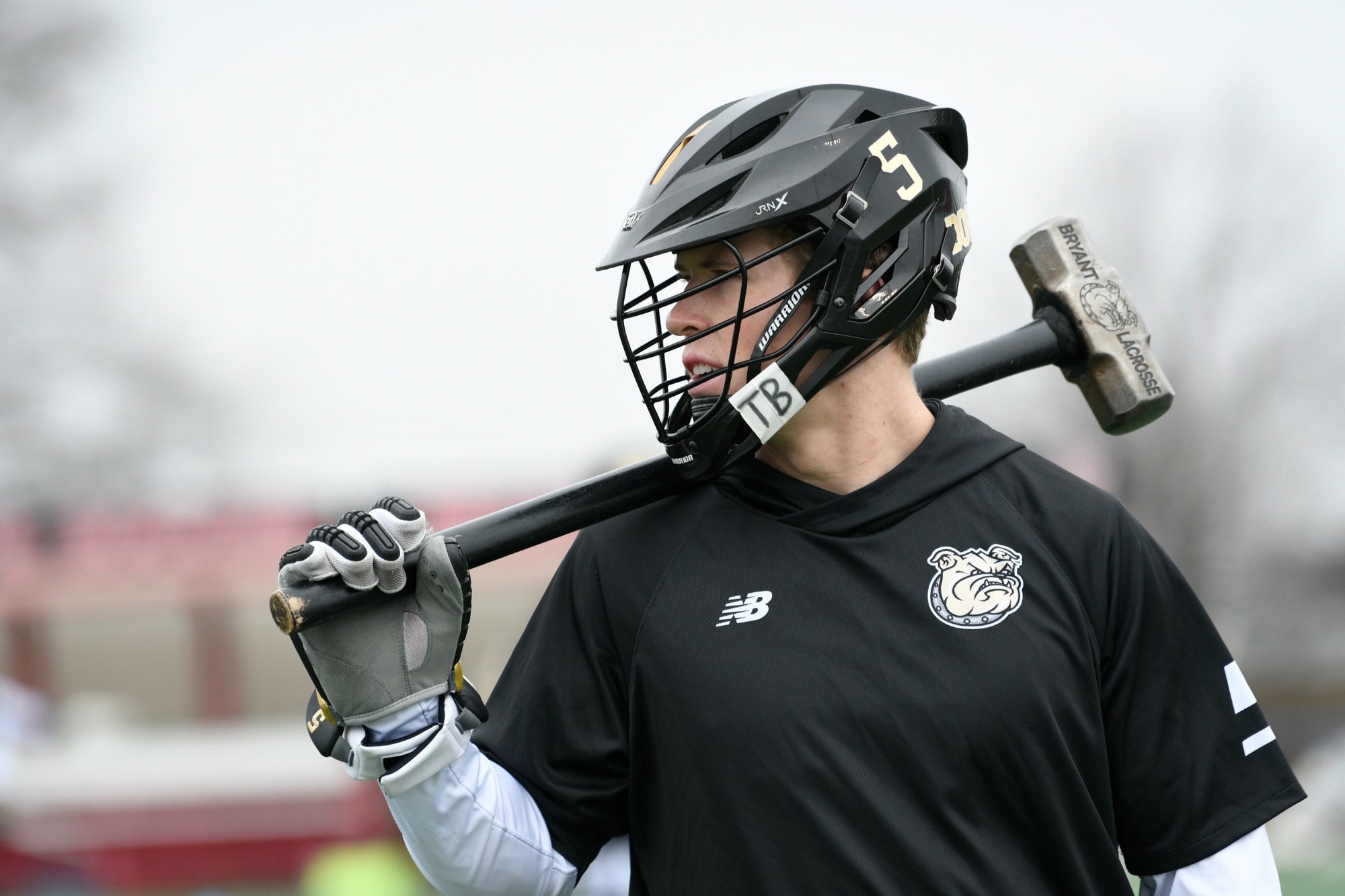 Tiernan Lathrop looks on, prepared to bring the hammer down