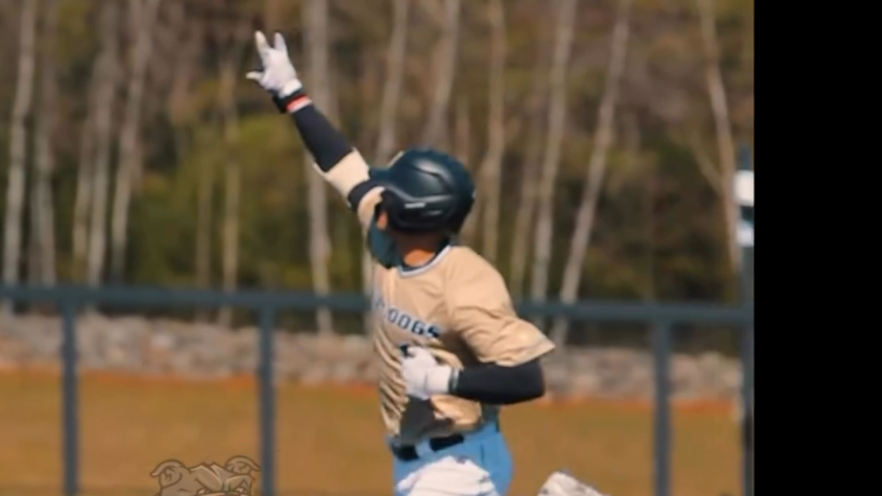 Fiatarone puts his hand in air rounding bases 