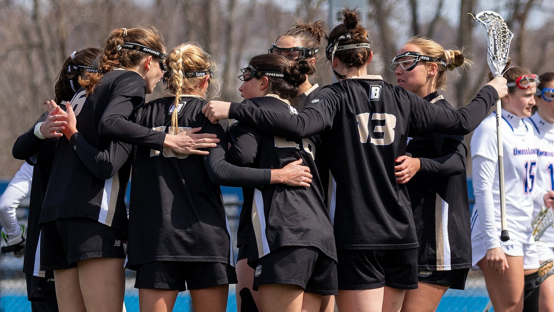 WLAX team huddle in road game at UML