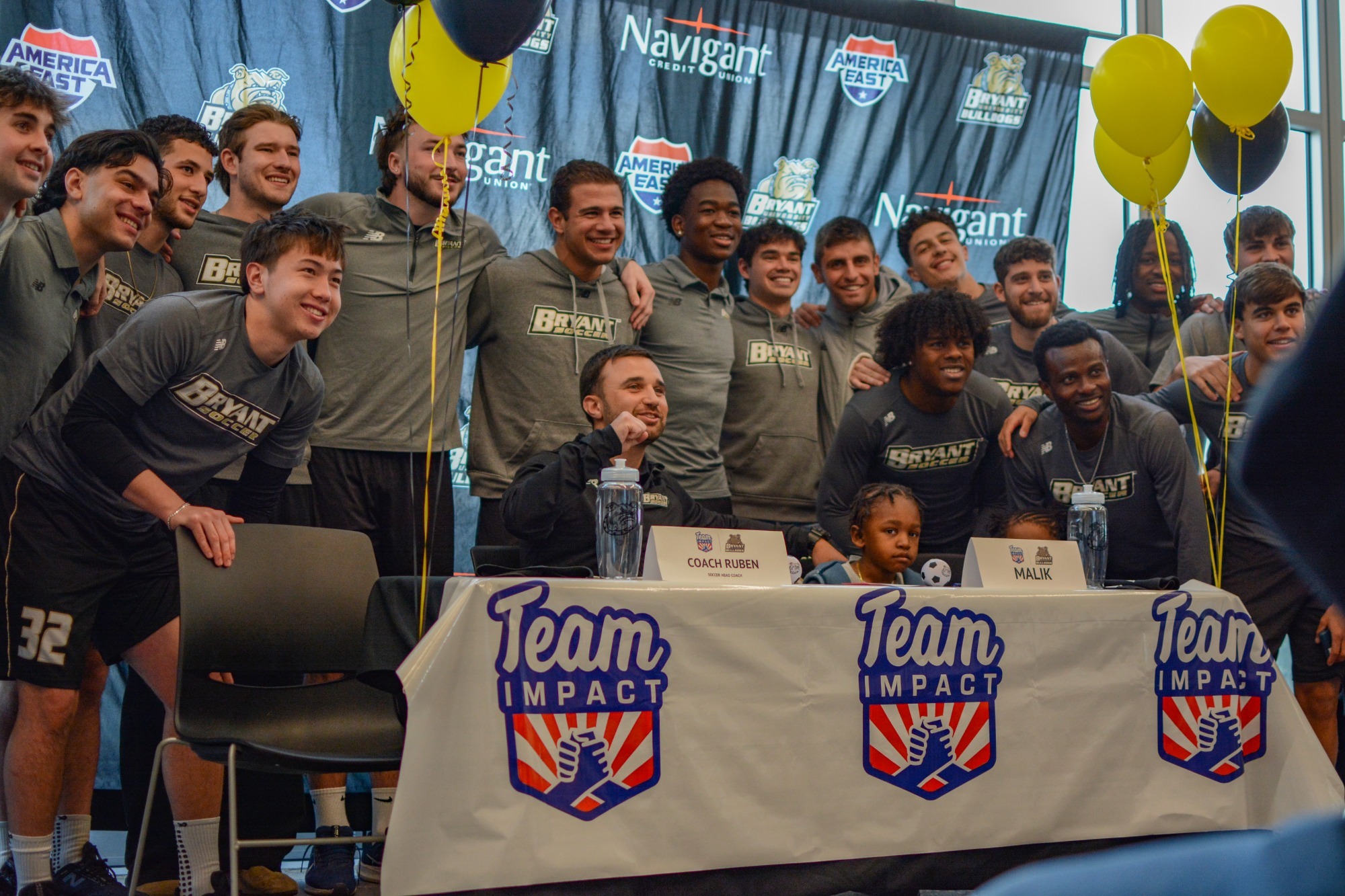 the bryant mens soccer welcomes 6-year-old Malik on signing day