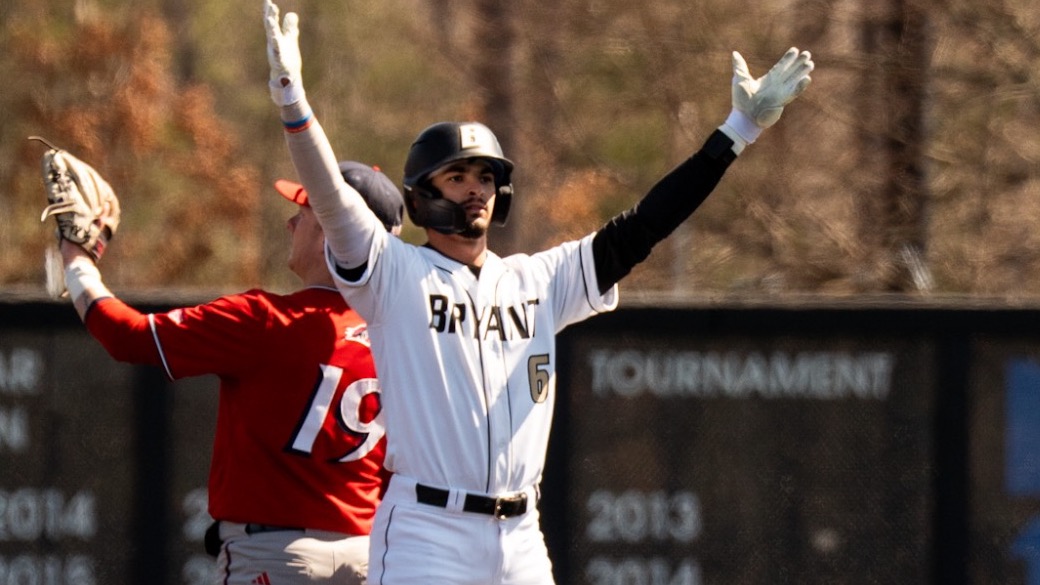 Casey Wensley and raises his hands at second versus NJIT