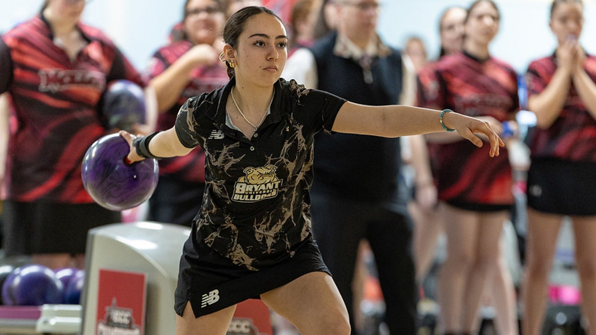 Madi Damer preparing to bowl in ECC championships