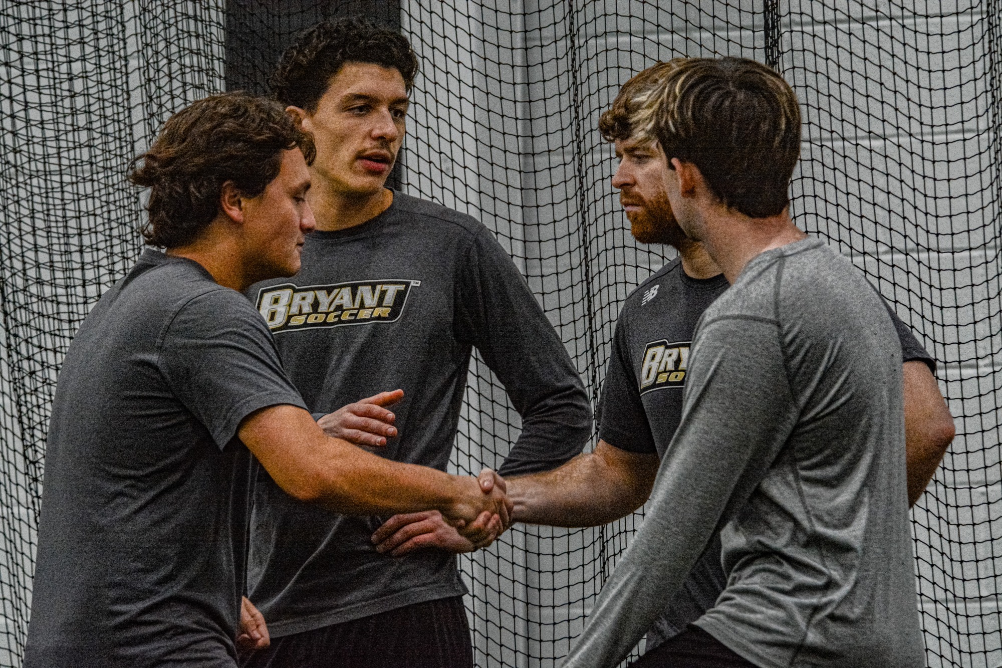 David Nuricubo and Caoimhin Mcconnell handshake during practice