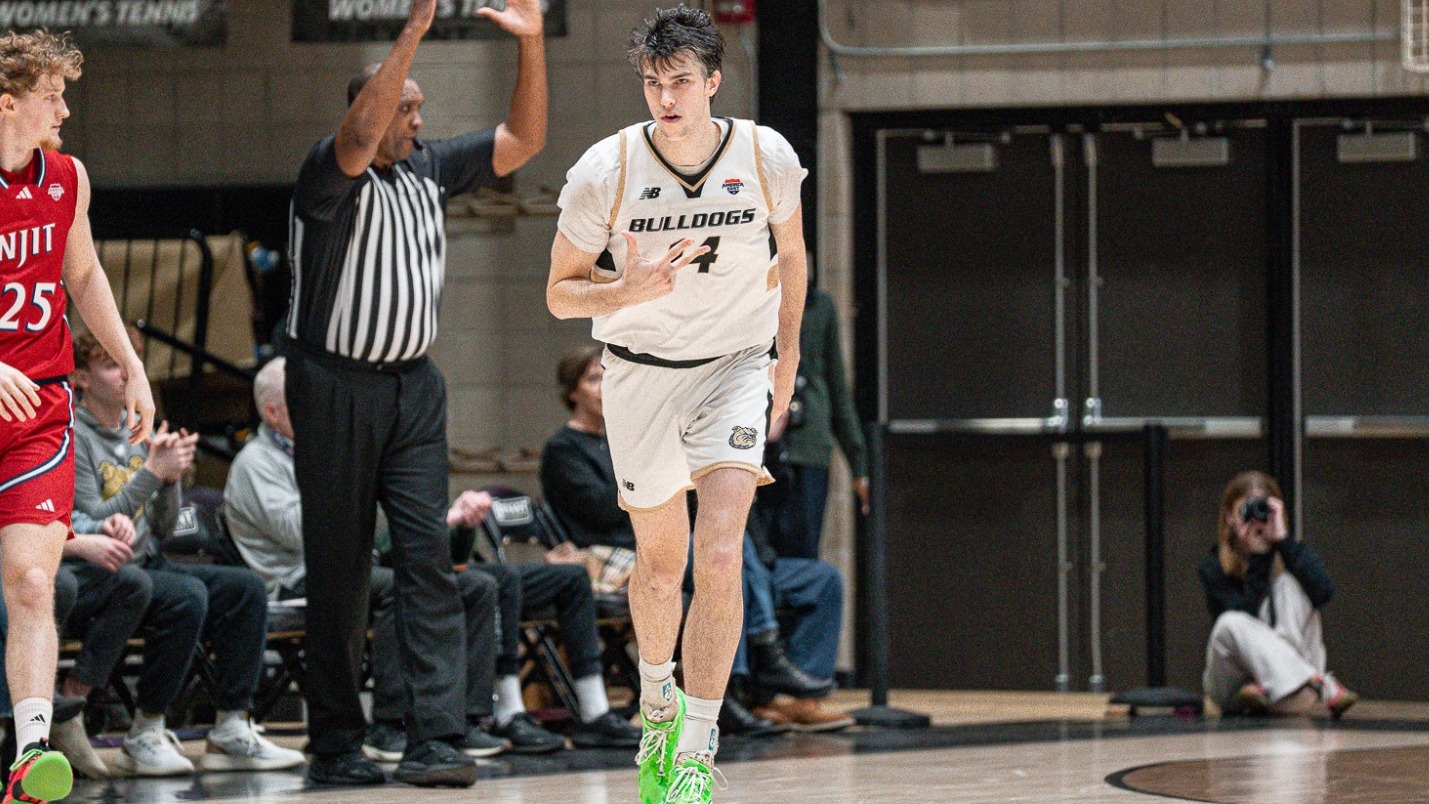 Keegan Harvey Celebrates a Three against NJIT