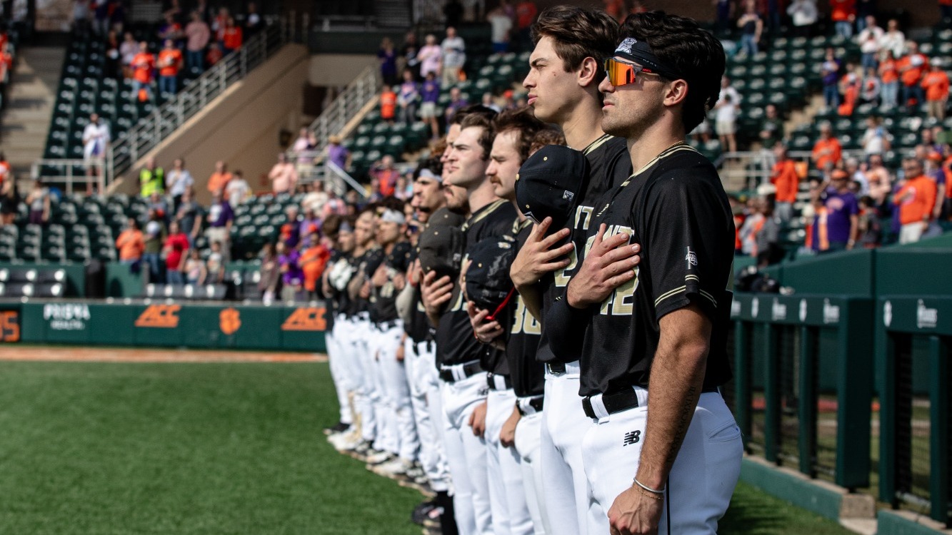 Baseball Team Lines up for National Anthem at Clemson