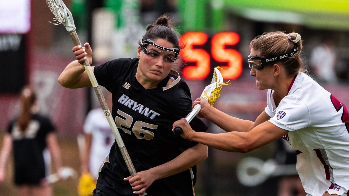 Gabby Constant is defended by a UMass player