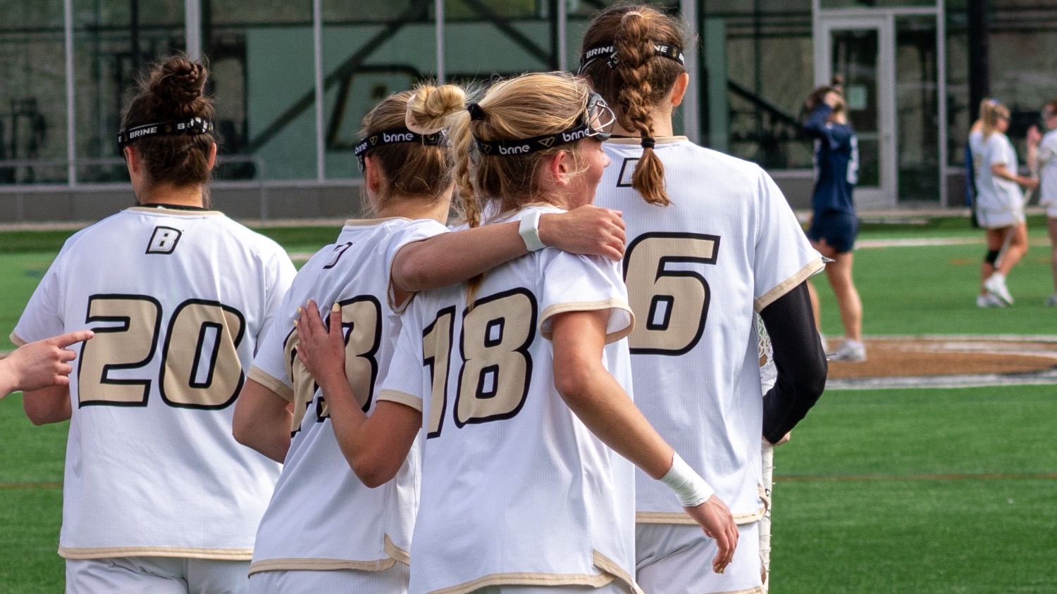 Ashling Marshall gets hugged by a teammate after scoring vs UNH 