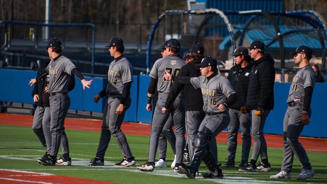Baseball team celebrates victory at Maine 