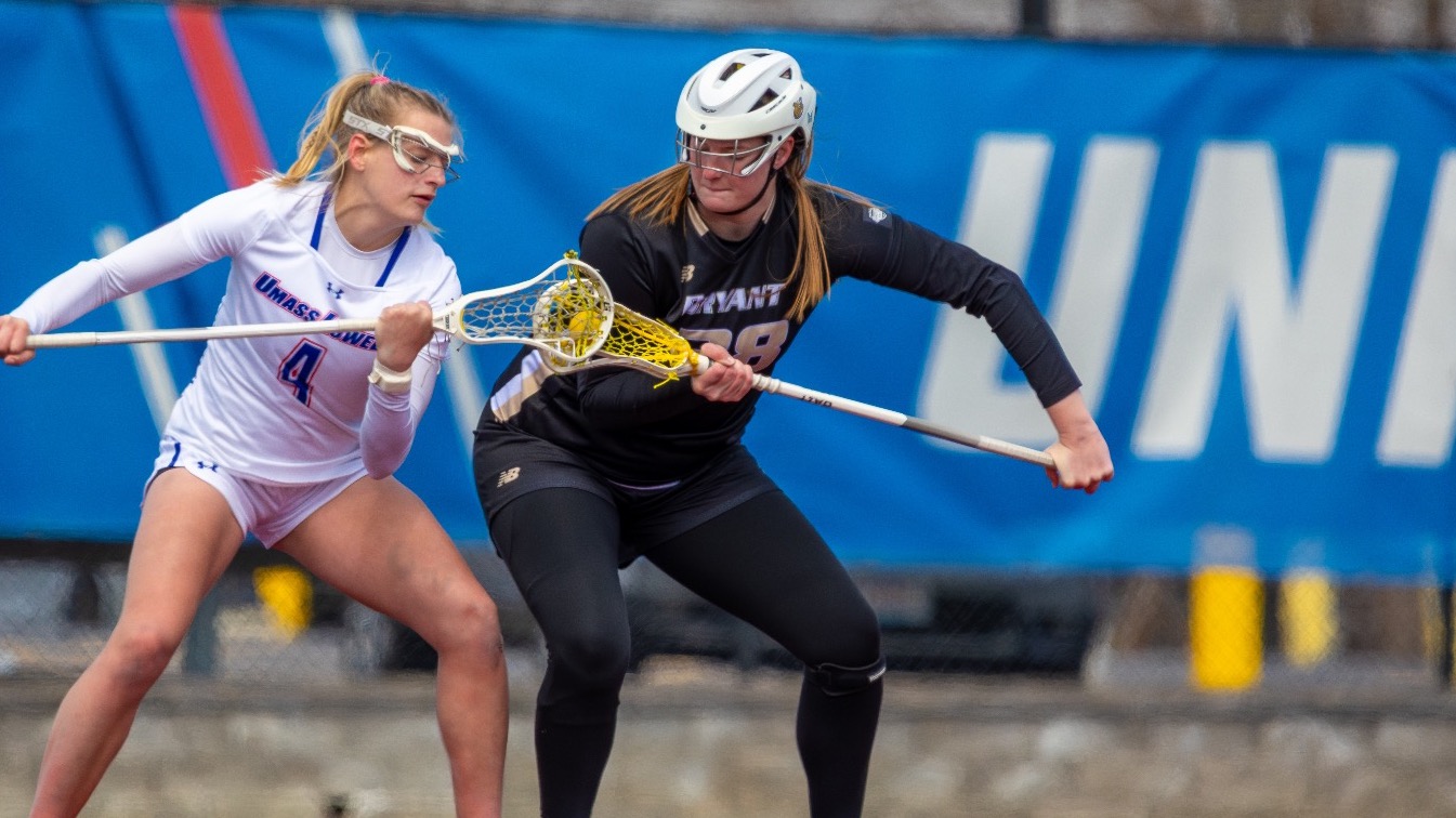 Julia Girard sets up for draw against UMass Lowell