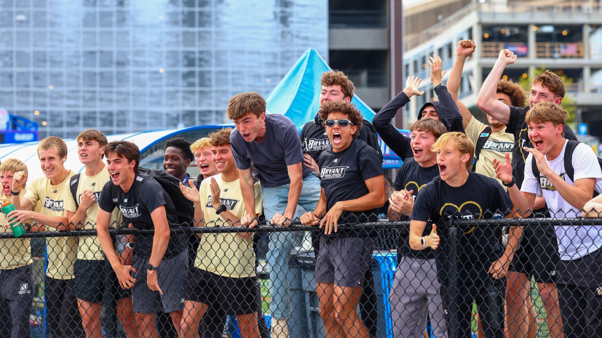 The Black and Gold cheering on their program from the sideline