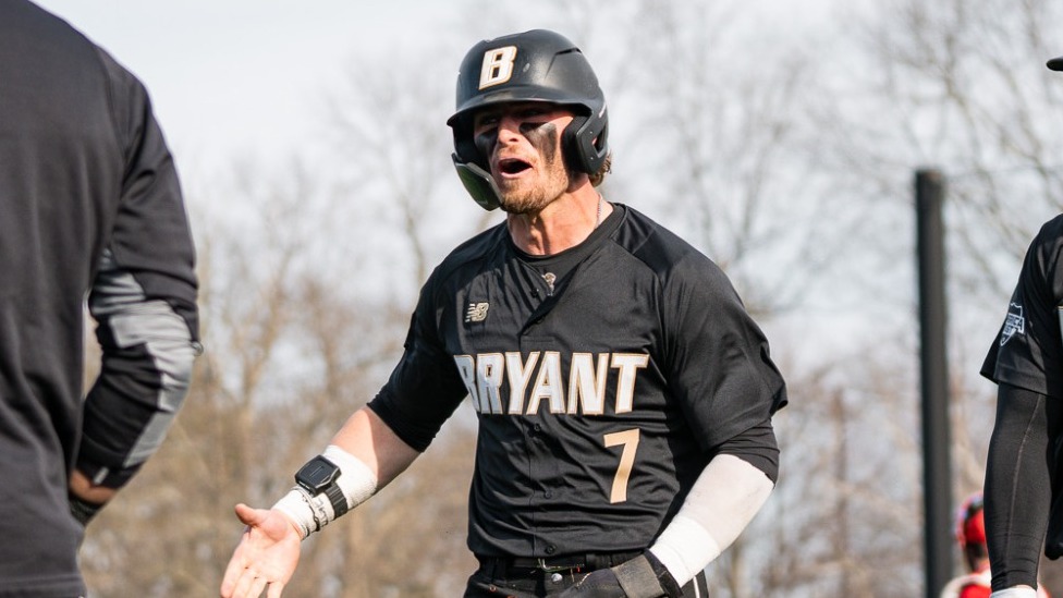 Gavin Greger comes back to the dugout after stealing home vs NJIT at home