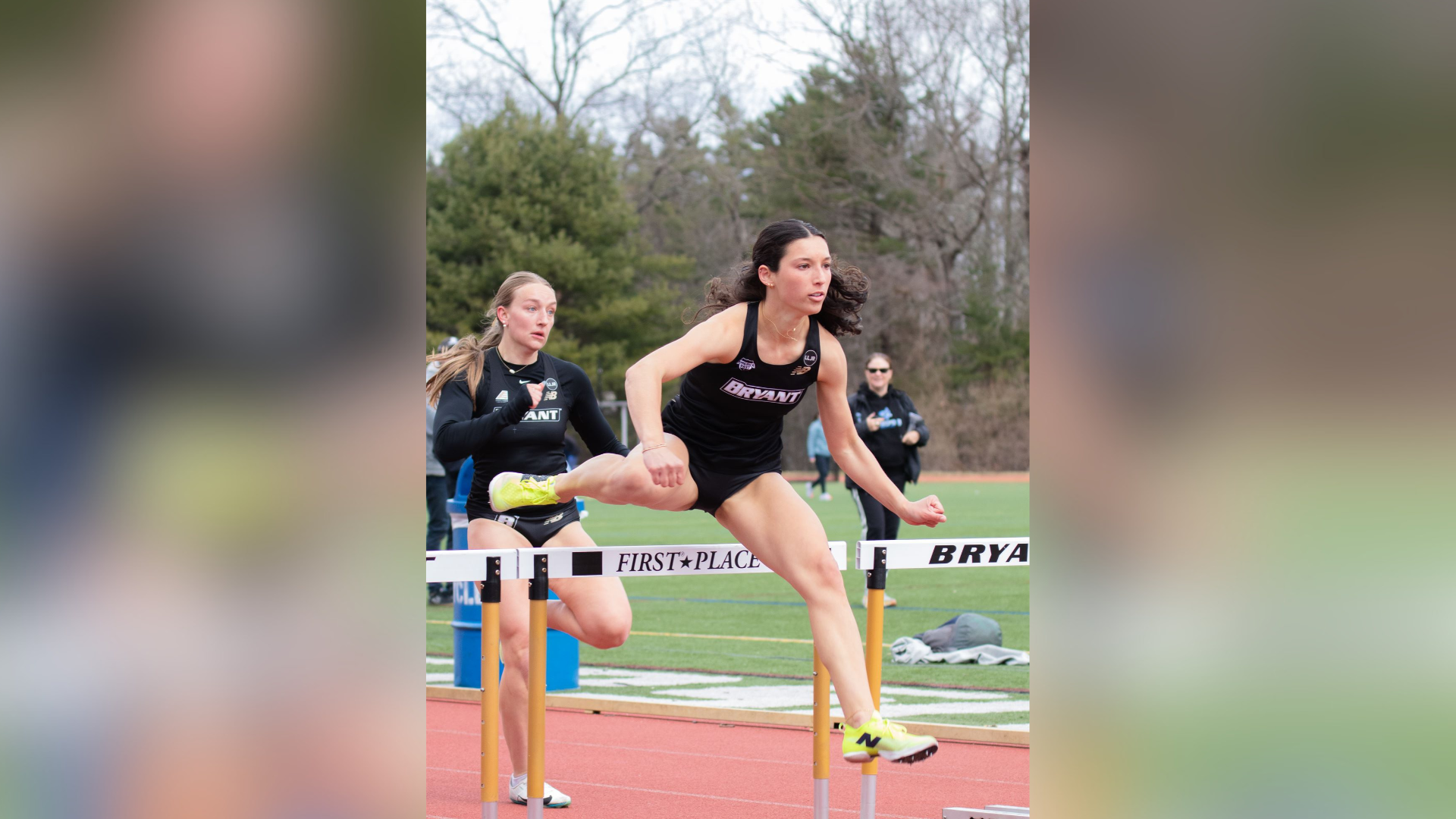 Georgia Wilson jumps over the hurdle