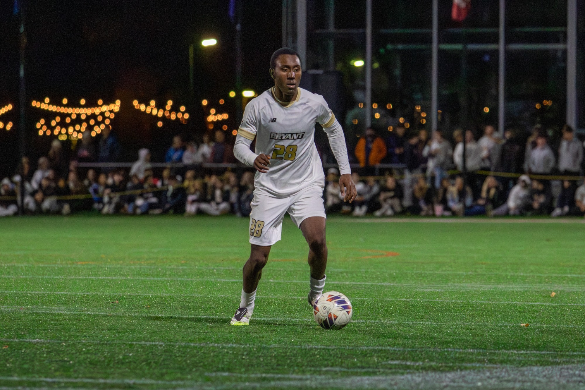Christien Merritt dribbles versus Vermont