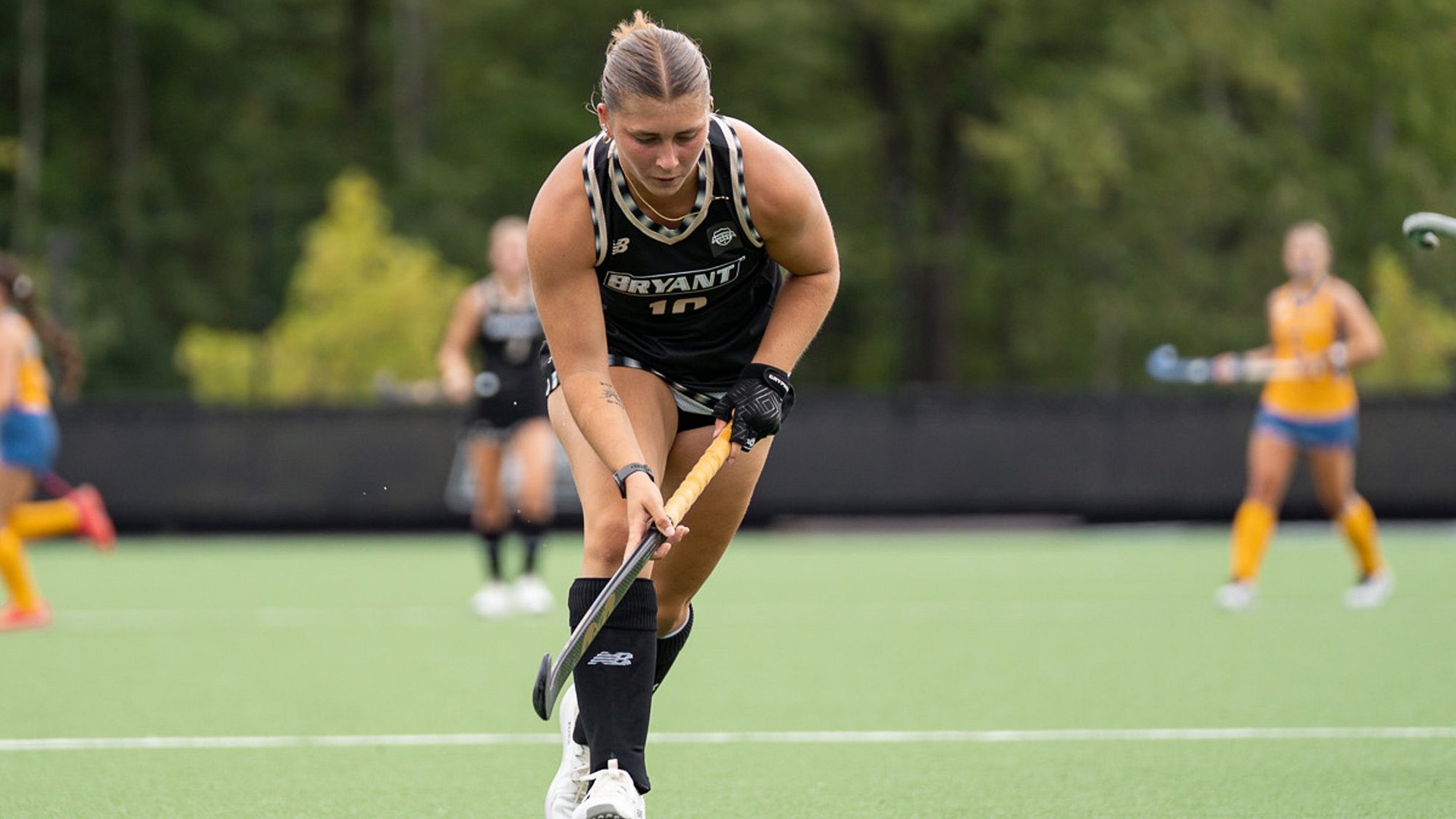 Maddy DeFilippo Carries the Ball up the Field