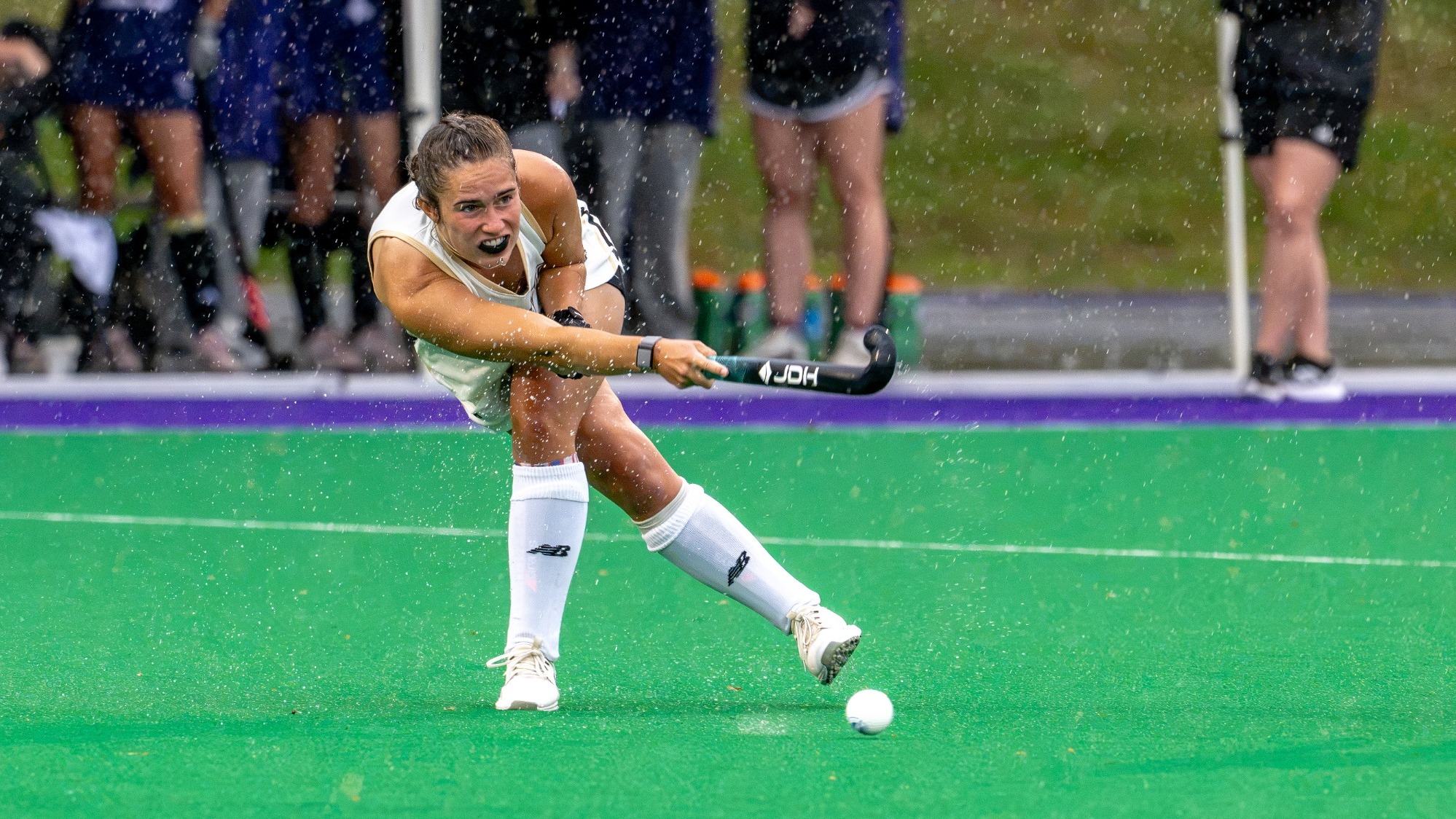 Kerin Birch passes the ball at Holy Cross