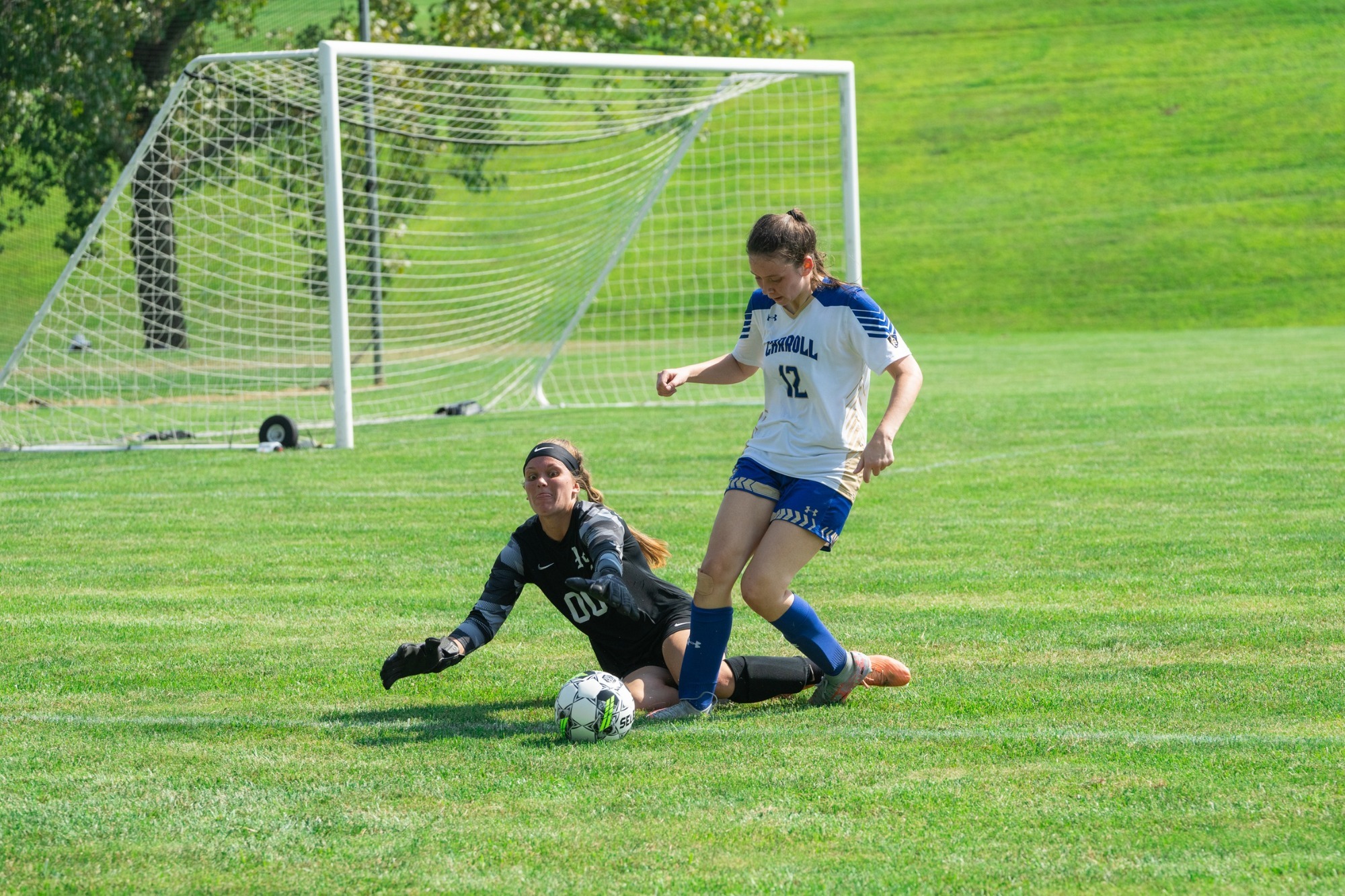 Kaminski gets ball away from goalie