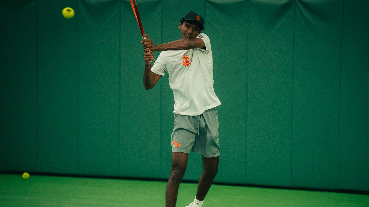 Advik Mareedu hitting a backhand