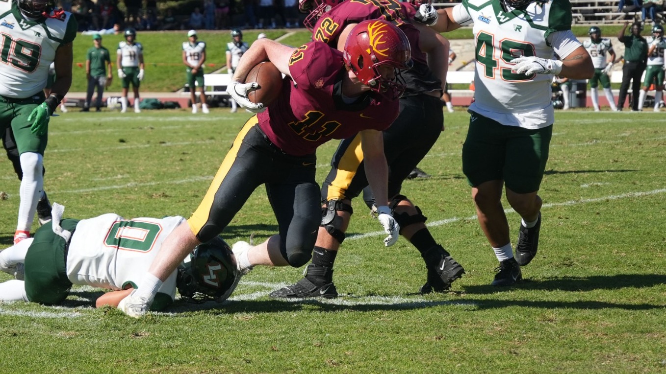 Cooper Nixon breaking a tackle