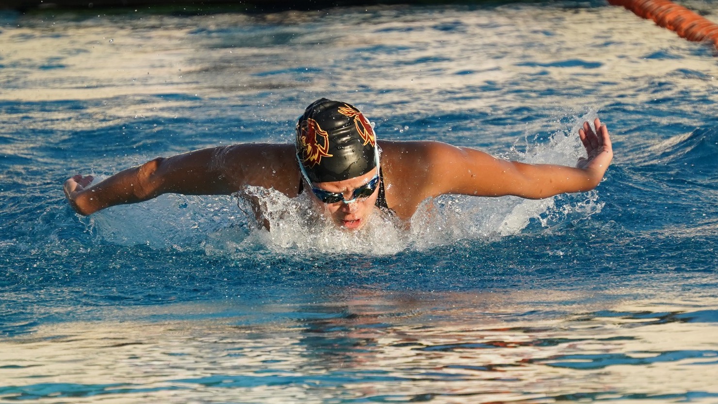 Molly Beetner swimming the butterfly