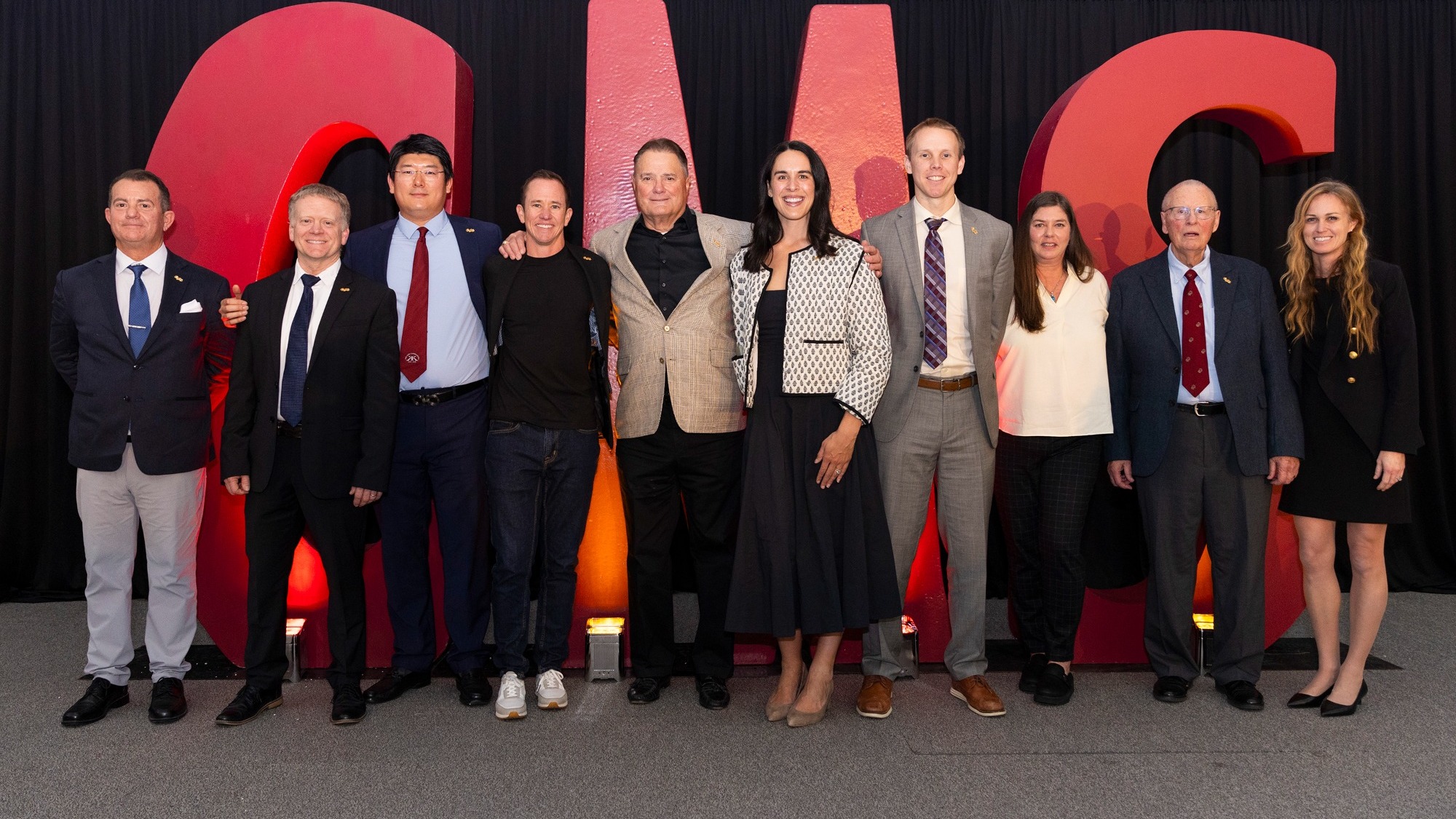 Group photo of 2026 Hall of Fame inductees in front of CMS letters