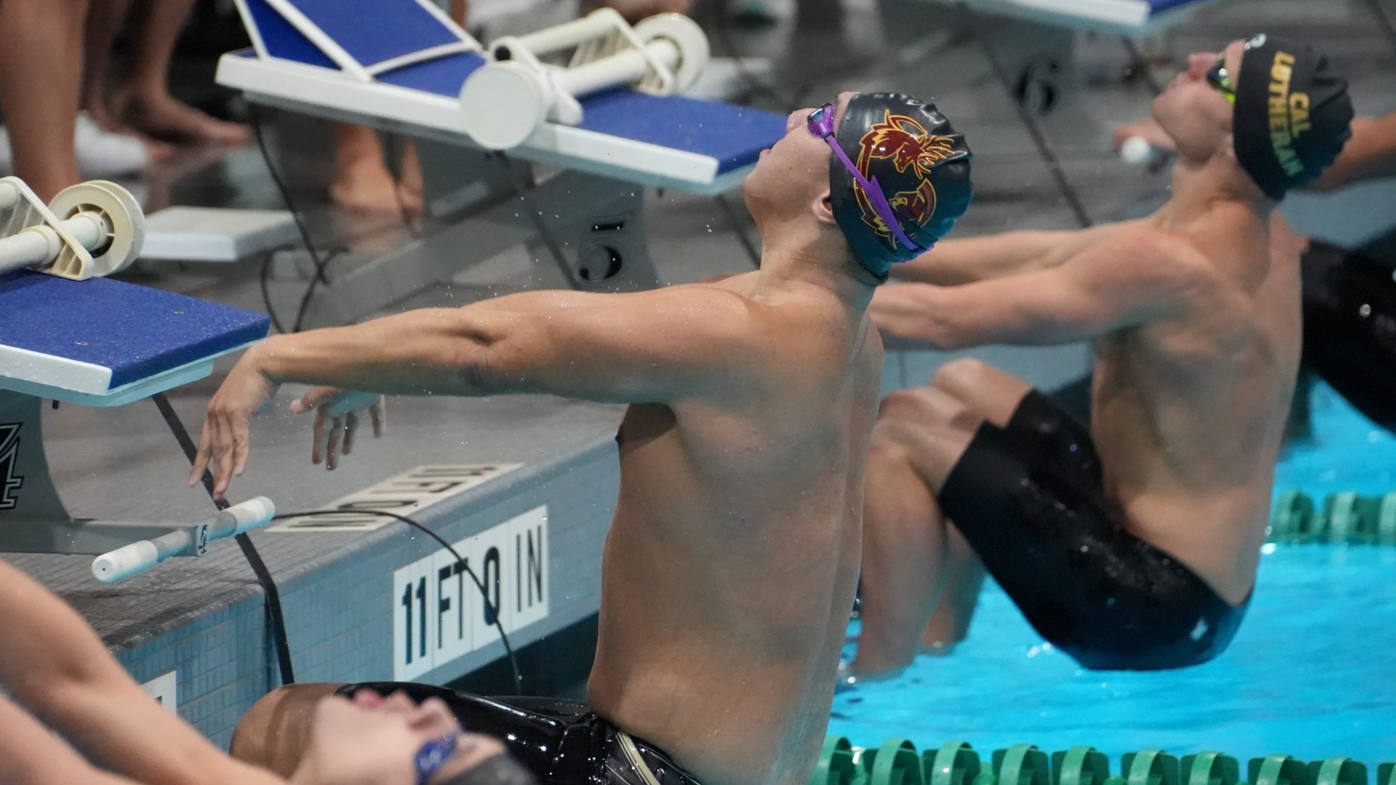 Adam Lee pushing off the wall to start the backstroke