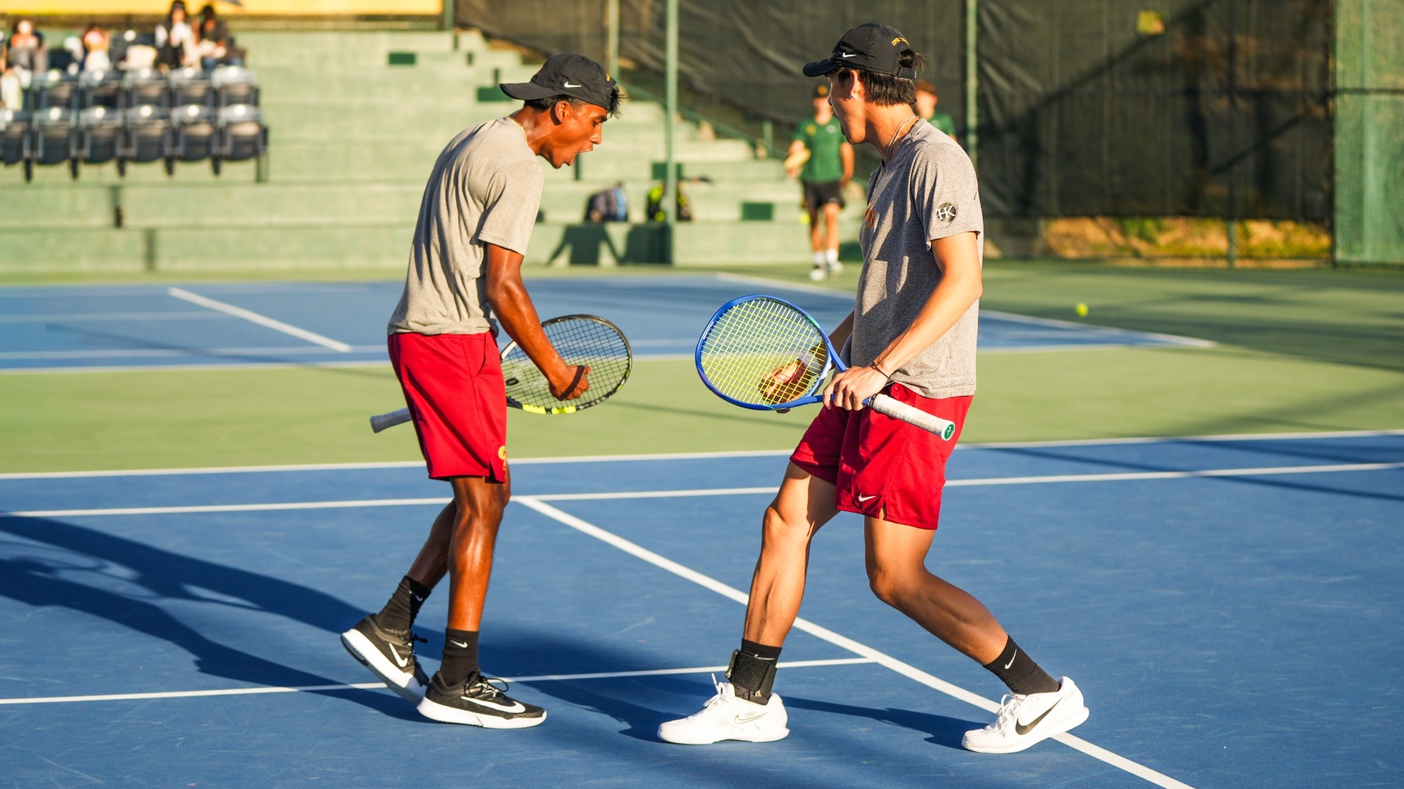 Sibi Raja and Josh Kim celebrate a doubles point