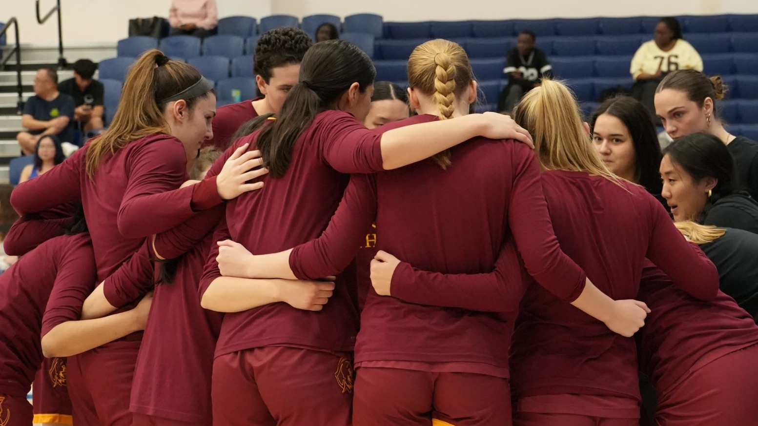 CMS Women's Basketball team huddle
